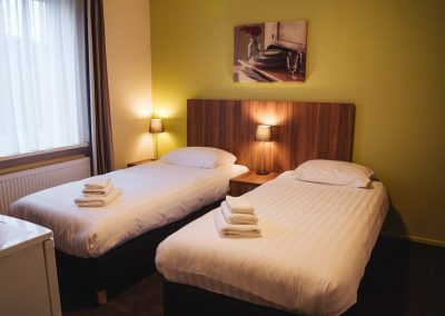 Tweepersoonskamer met 2 losse bedden - Hotel Eckhardt Uithuizen
